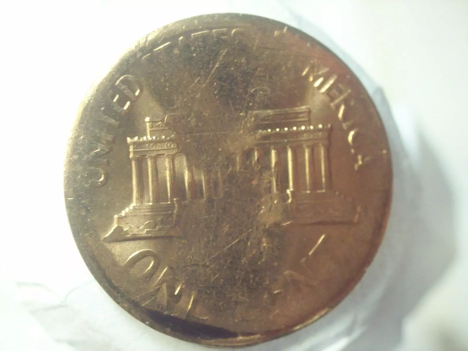 Split-Planchet-Struck-On-A-1960-Planchet-Error-1.5-Grams-Weak-Strike-On-Rev